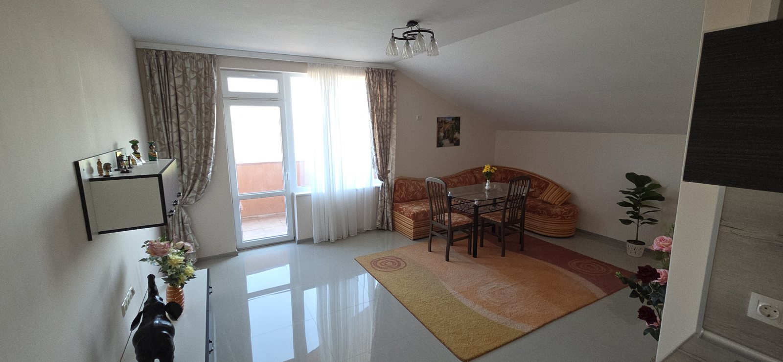 Photo 008 · Living space with kitchen and dining table