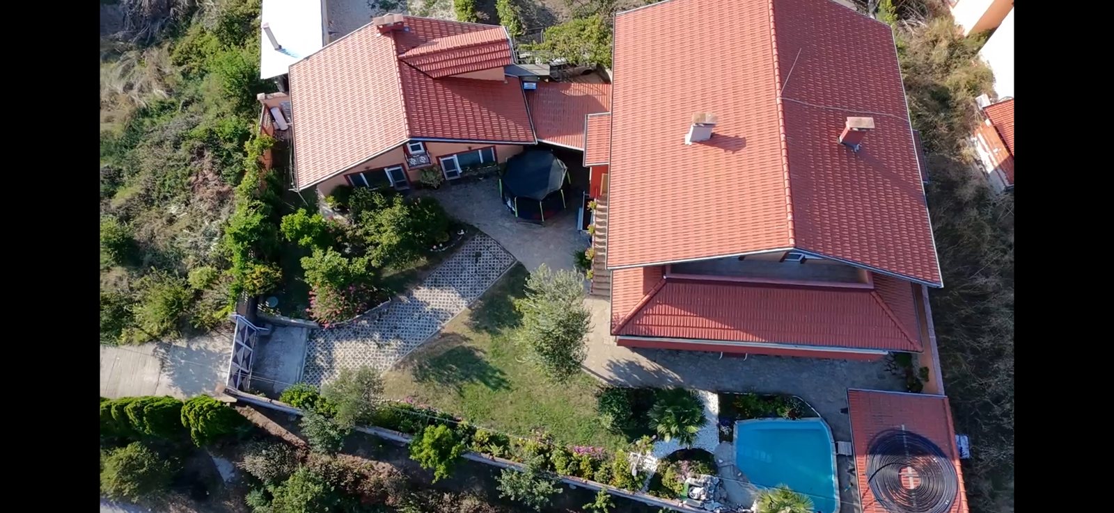 Photo 100 · Aerial view of the villa and grounds