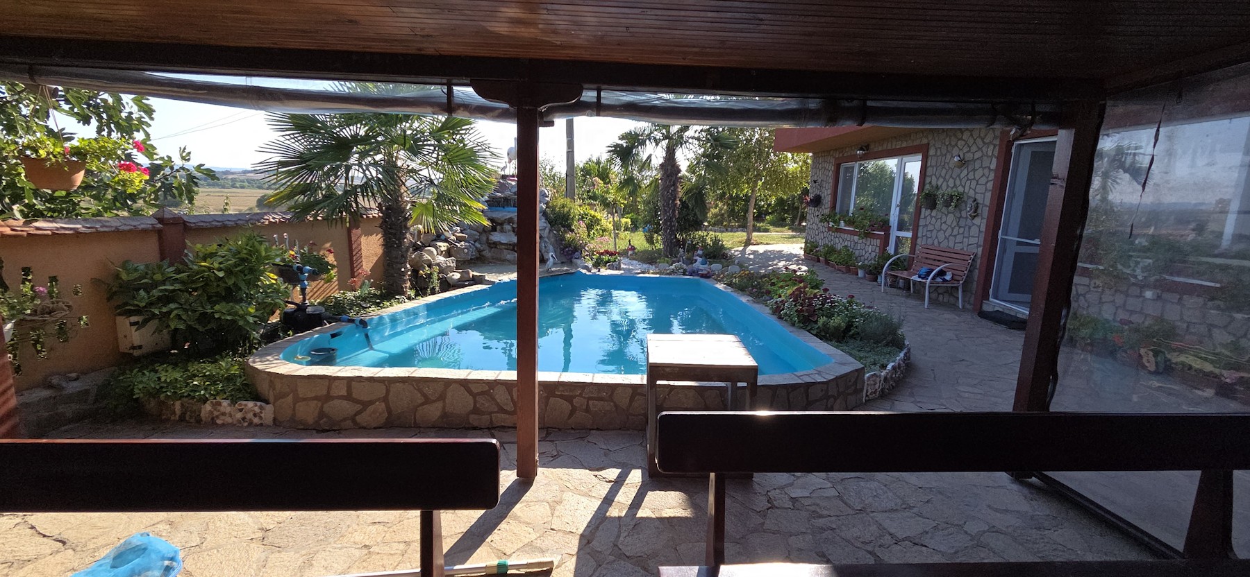 Villa pool and surrounding terrace