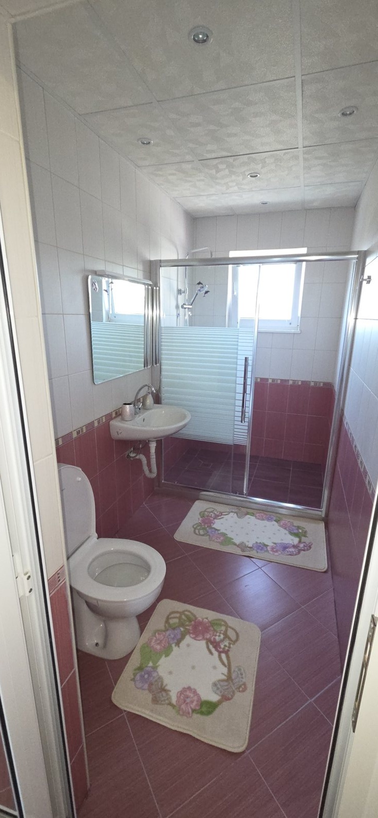 Photo 058 · Shower room with red tiles