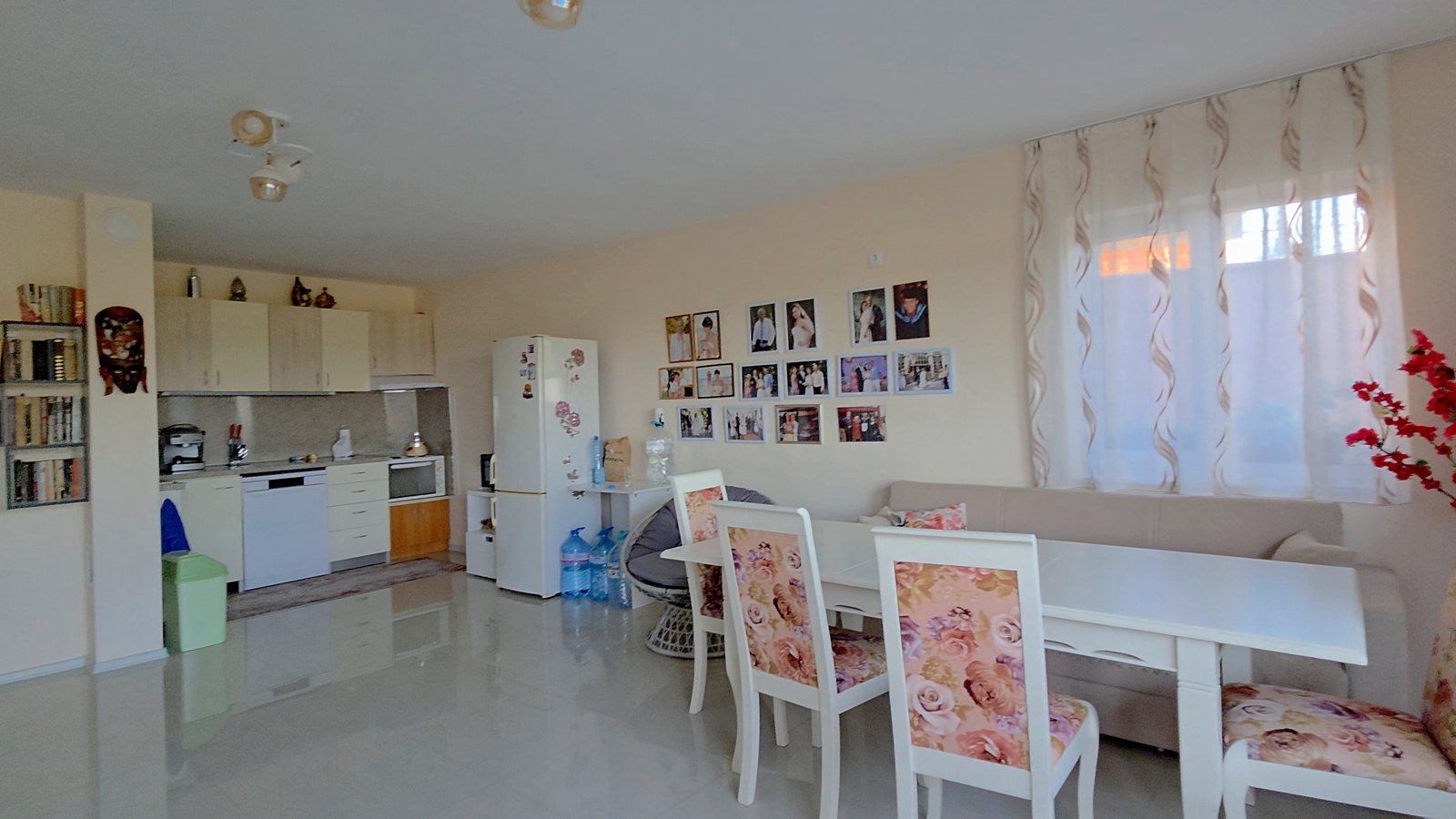 Photo 093 · Kitchen and dining space with decorative details